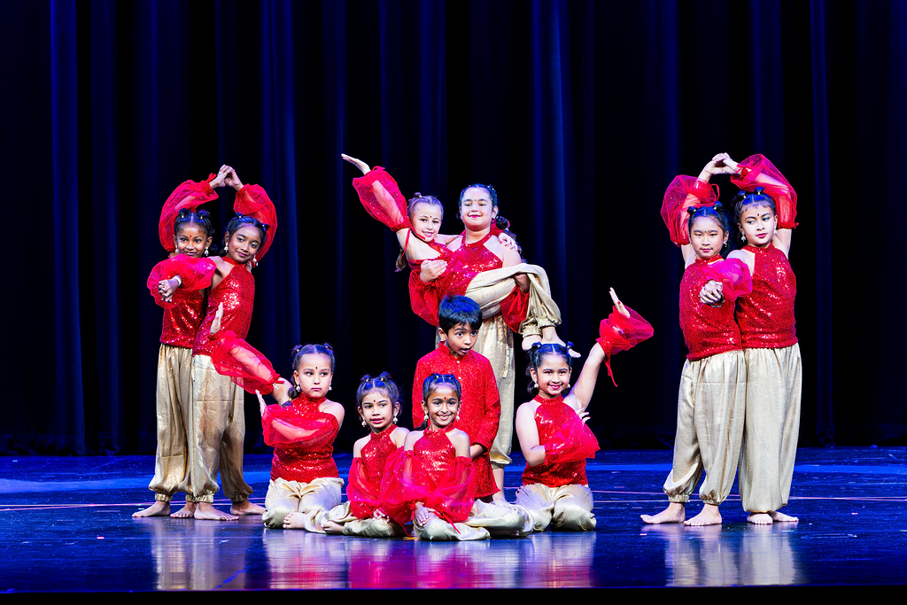 Kids Bollywood dance group performing at spring recital 2026