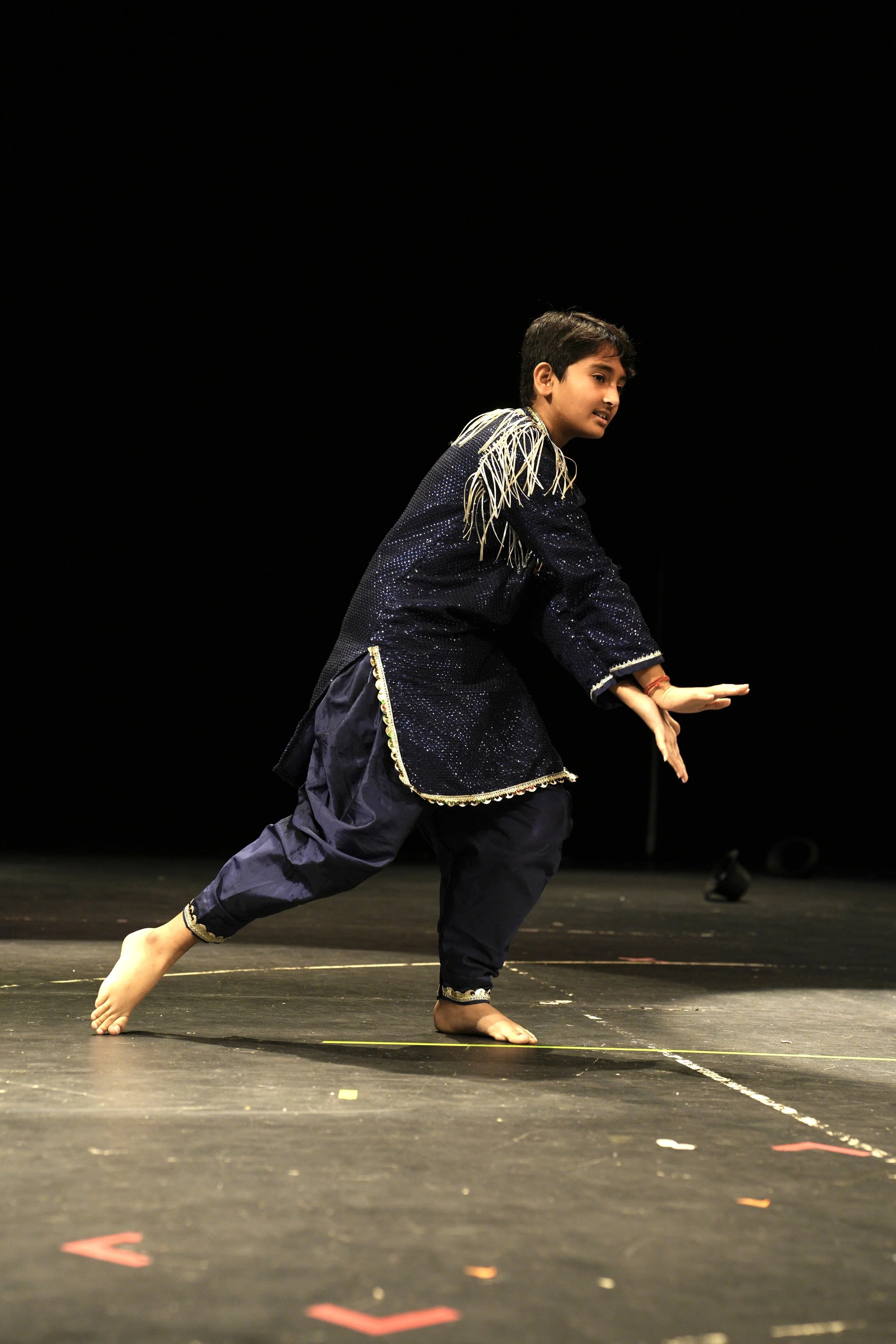 Teen dance class presenting a polished Bollywood performance at Fall Recital event