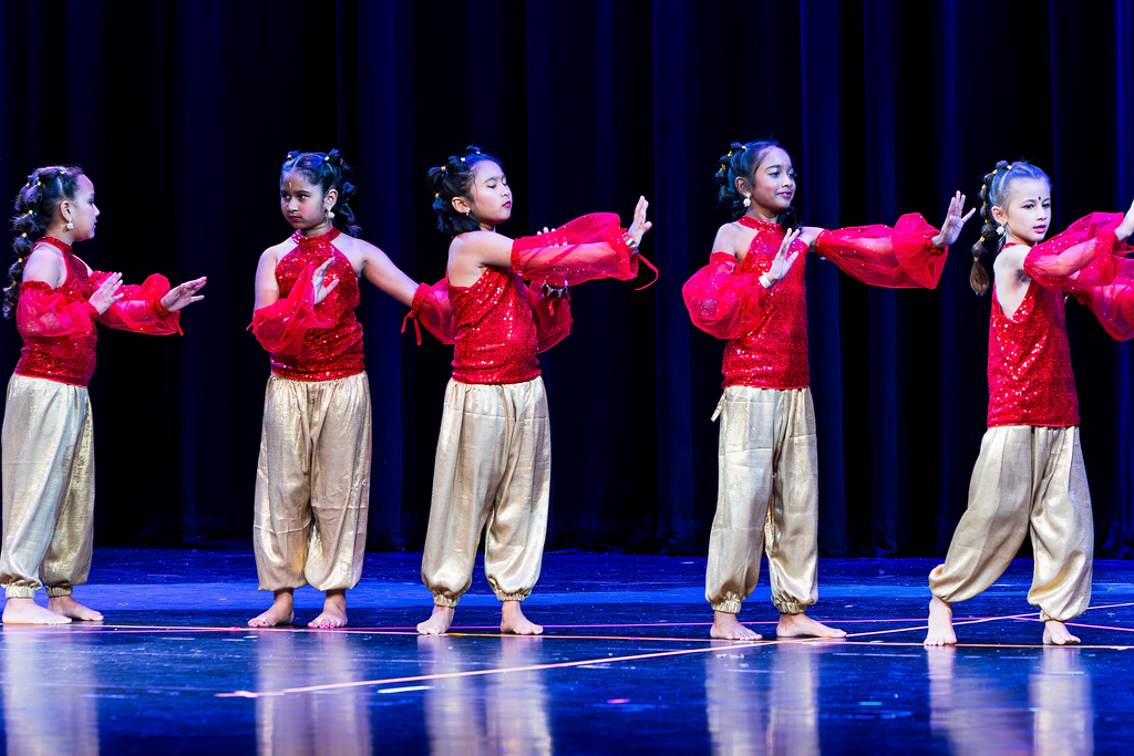 Kids striking a pose during Bollywood recital summer season