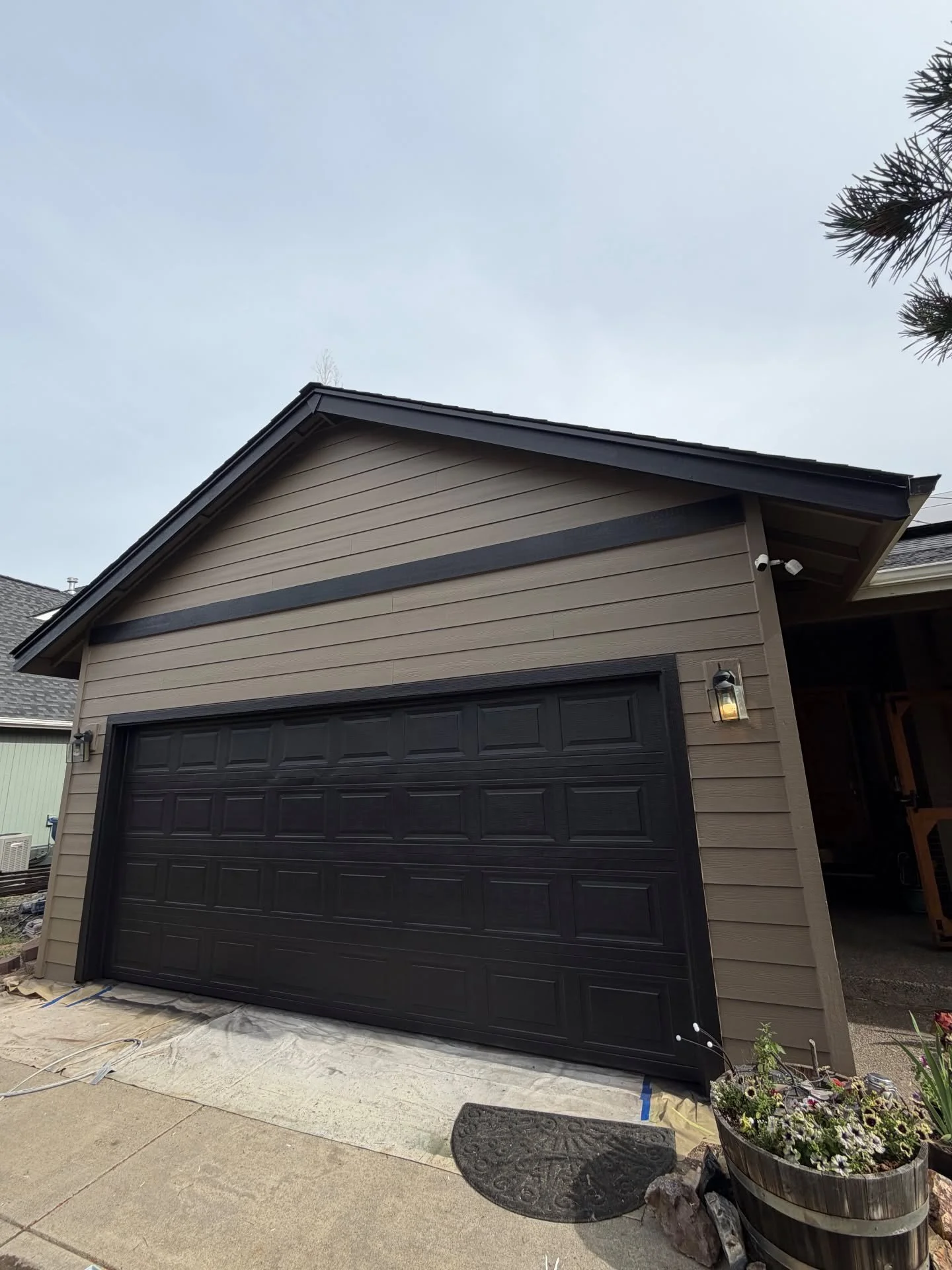 bend-oregon-exterior-repaint-after-virtual-taupe-black-garage-door.jpg