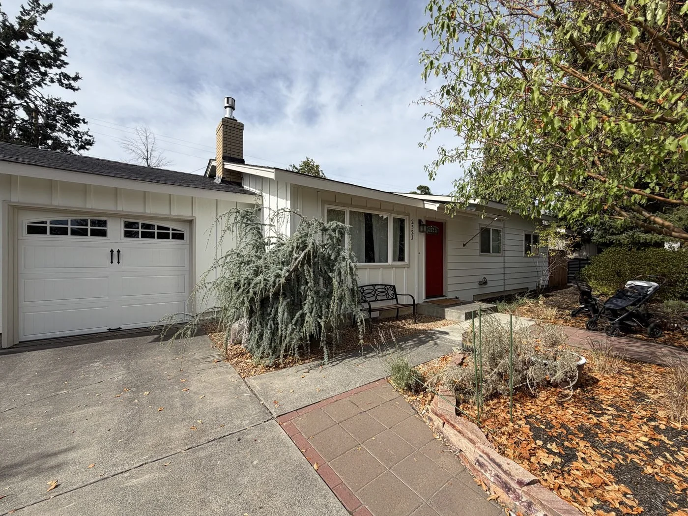 Bend single-story home and garage after exterior painting in Alabaster with Accessible Beige trim