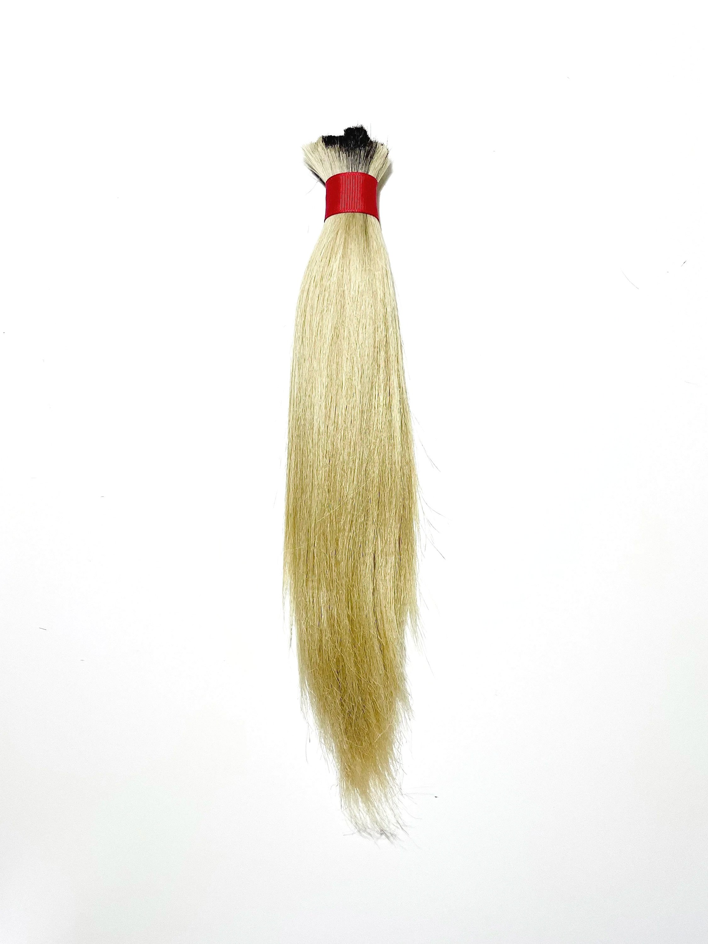 Hair 2019,
2019,
artist’s hair tied with red ribbon,
34.5 x 6.5 cm (13.58 x 2.56 in.)