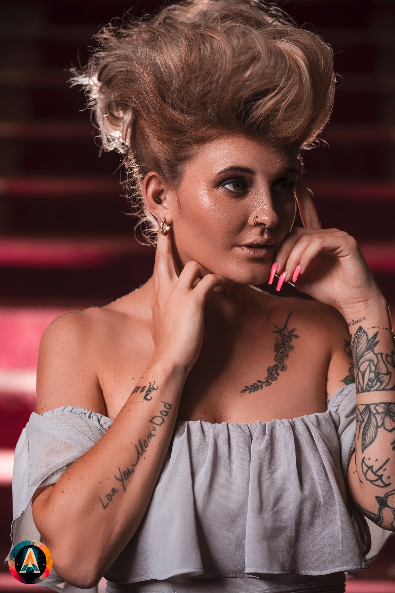 Blonde model courtney france poses in the haunted indiana state sanitarium shop / hair salon in a elegant blue dress.