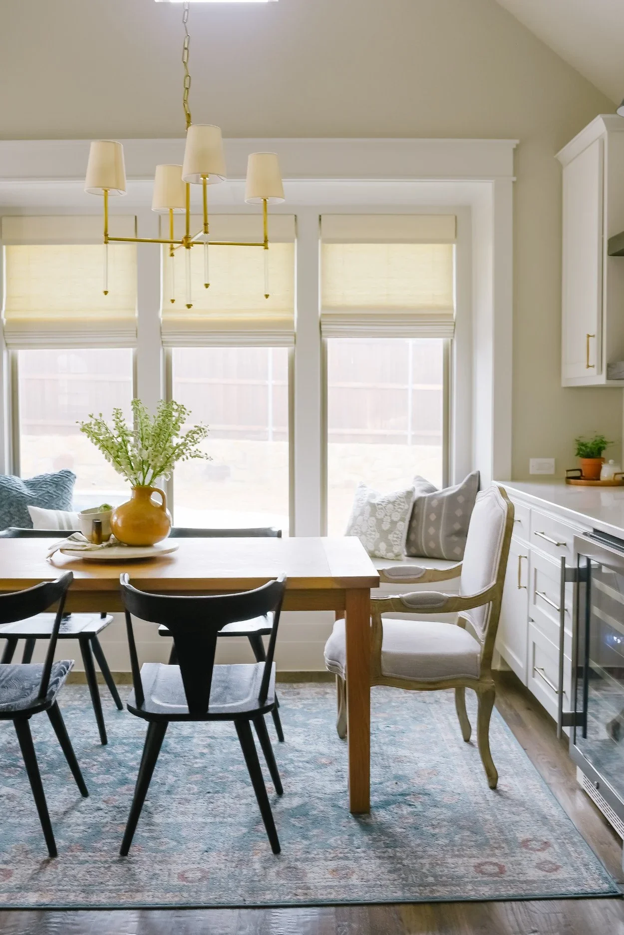 Crisp+White+Kitchen+_+Dining+with+Blue+Island+by+House+Sprucing+9.jpg.webp