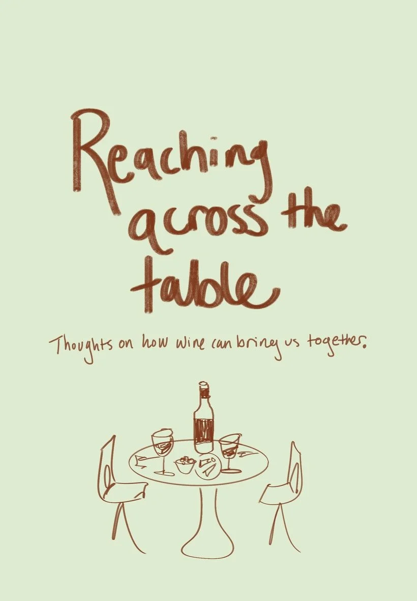 Reaching across the table.