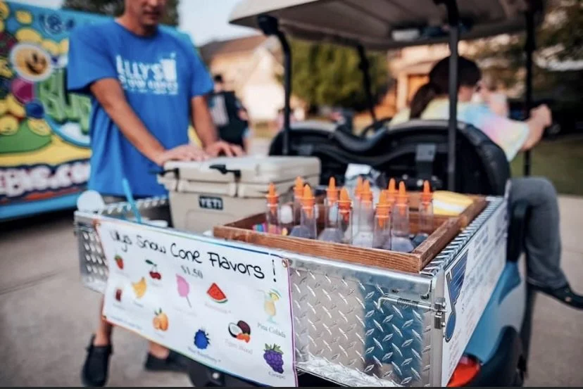 Snow cones syrups in a golf cart