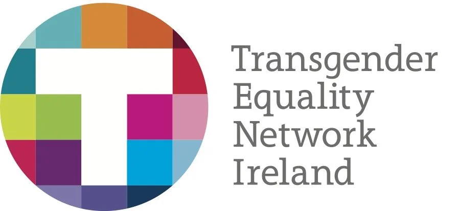 Logo of Transgender Equality Network Ireland with a colorful mosaic circle and the letter 'T' in the center.