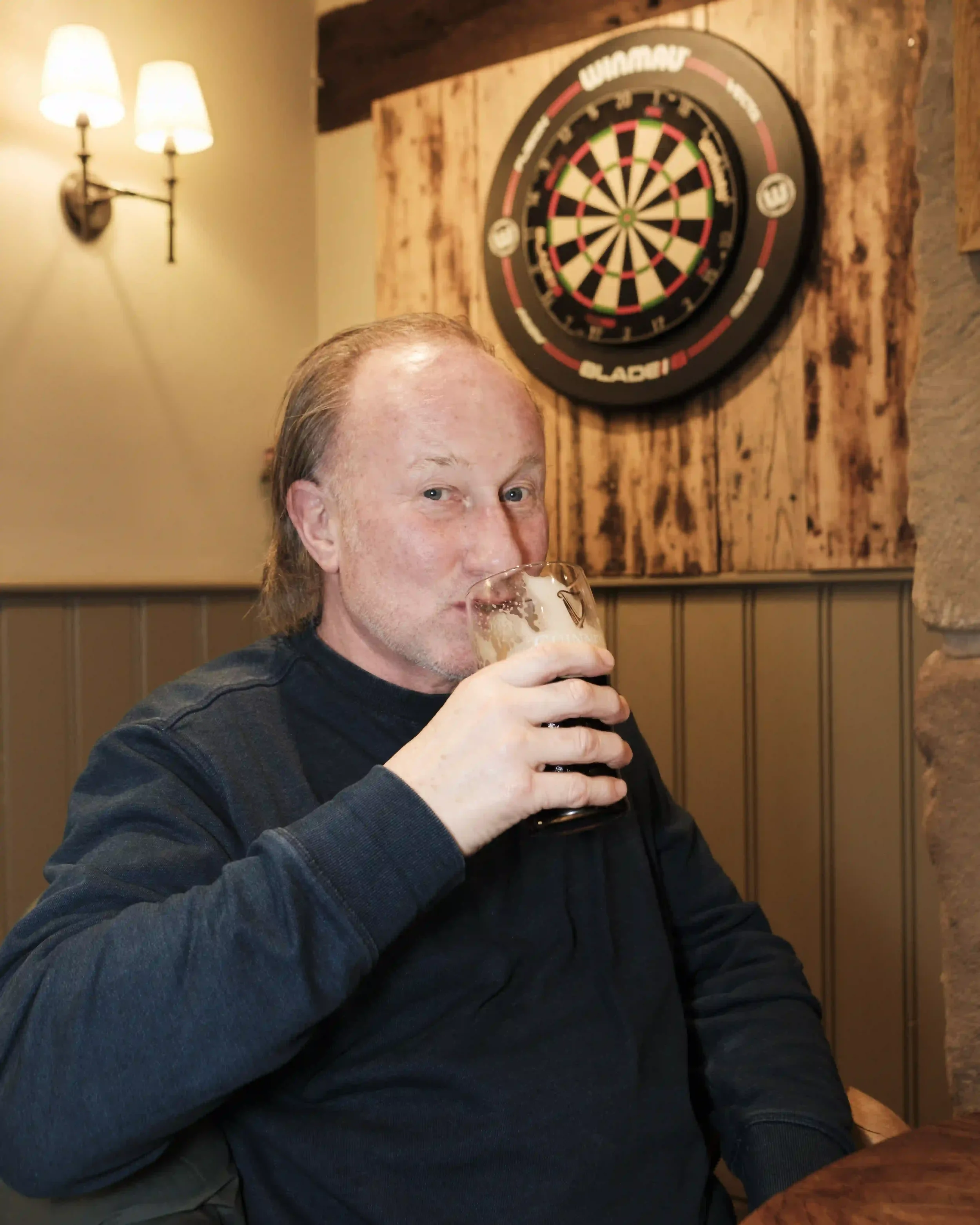 matthew-morgan-crown-inn-lea-local-customer-darts.webp