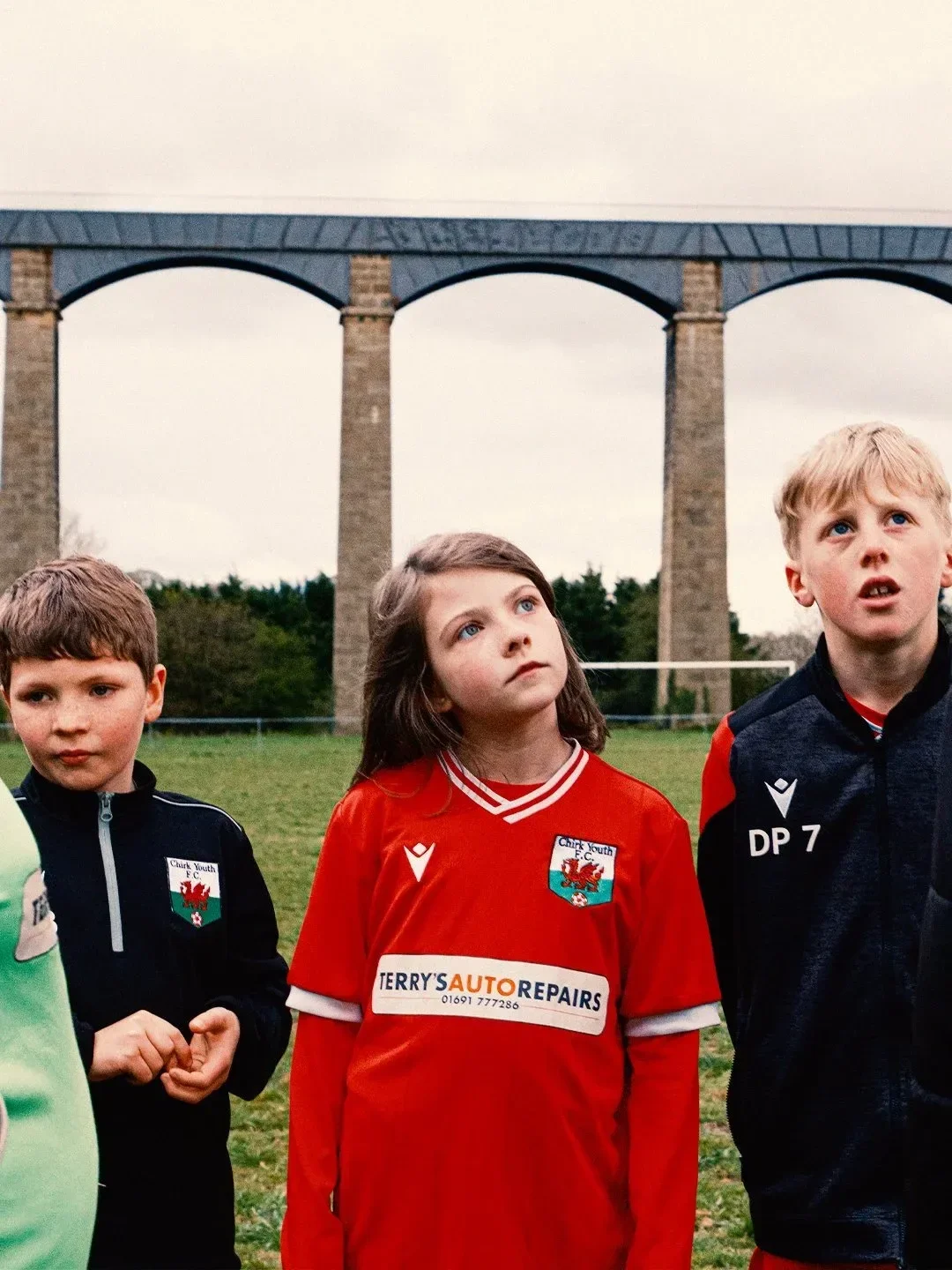 chirk-youth-fc-macron-portrait-aqueduct.webp