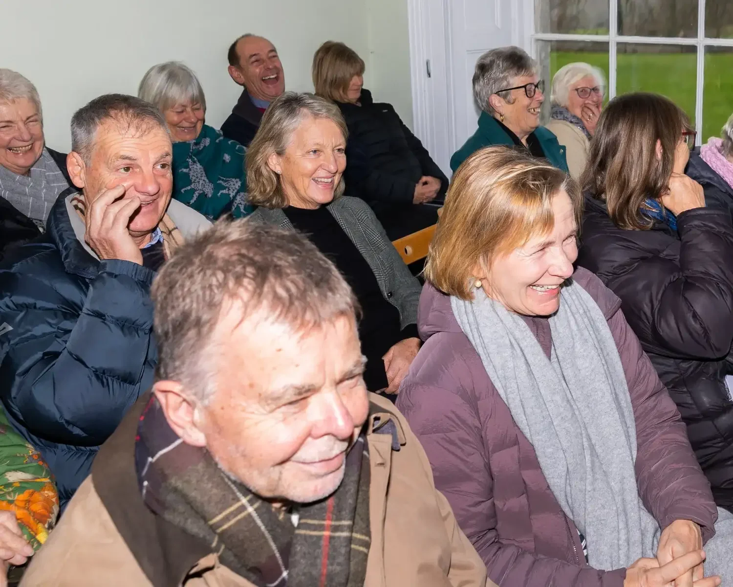 matthew-morgan-treverva-male-choir-audience-joy-enys-house.webp