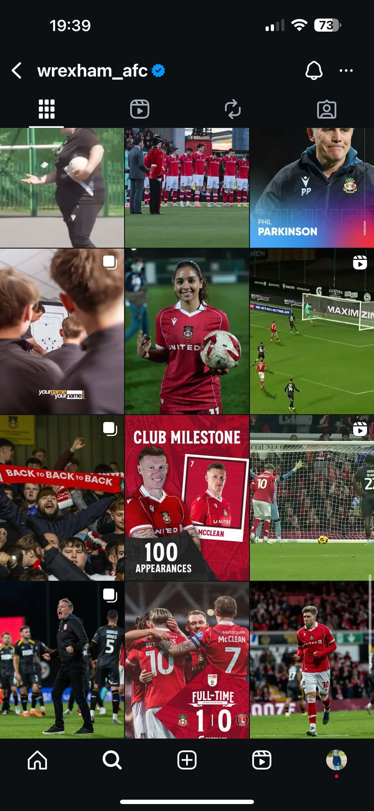 A screenshot of the Wrexham AFC Instagram grid showing a collaborative post with Your Game Your Name. The thumbnail features an over-the-shoulder shot by Matthew Morgan of youth players focused on a tactical board. The Wrexham AFC crest and 'yourgame