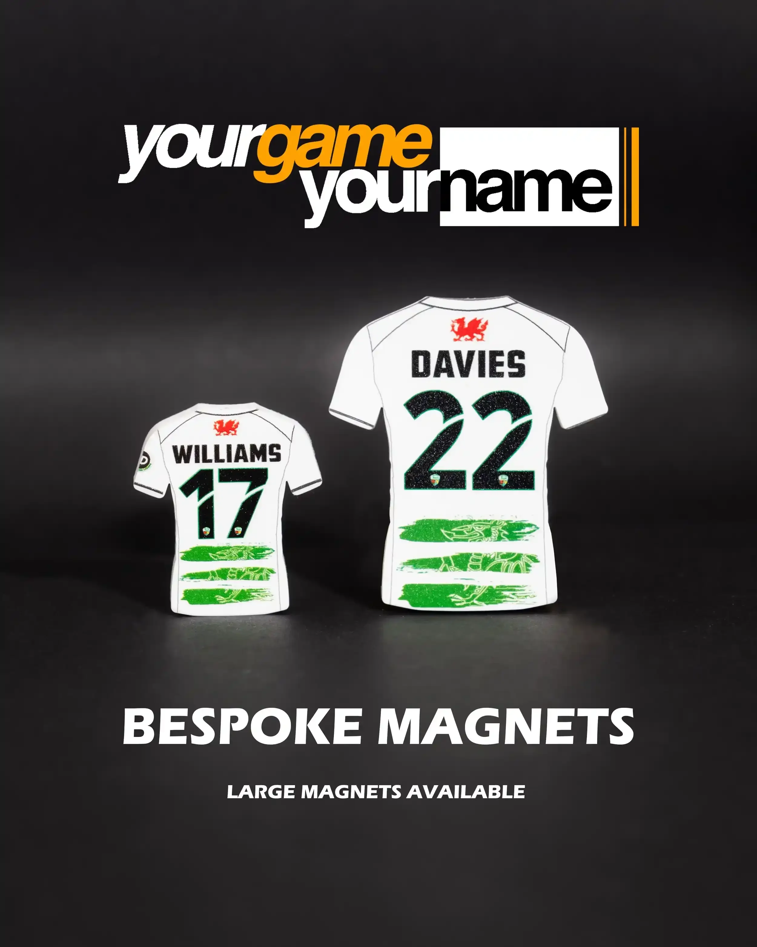 A high-contrast commercial product image for 'Your Game, Your Name'. The graphic features the brand logo at the top and the text 'BESPOKE MAGNETS' and 'LARGE MAGNETS AVAILABLE' at the bottom. In the center are two white shirt-shaped magnets for TNS F