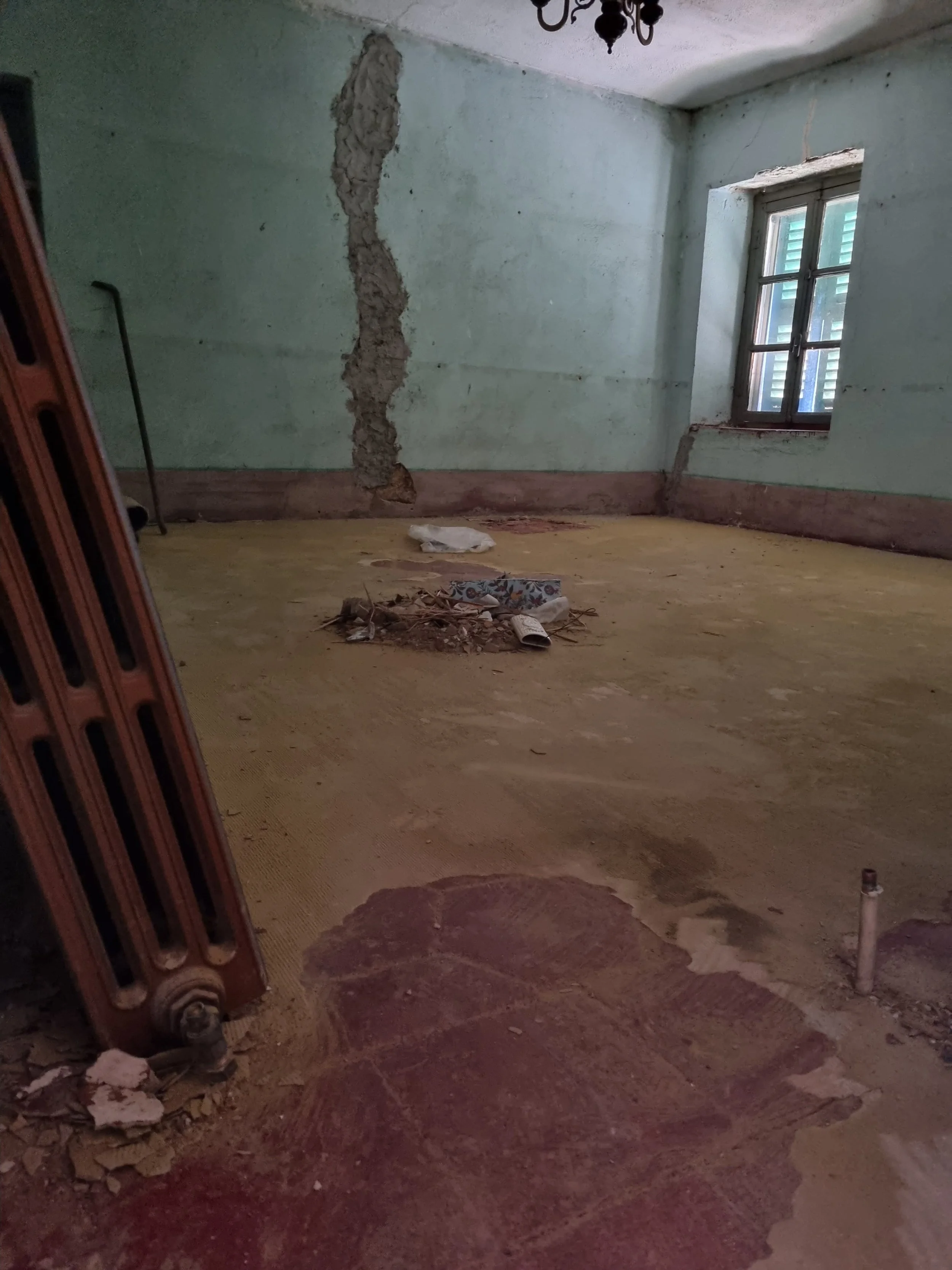 Inspecting construction during a renovation walkthrough in Italy.