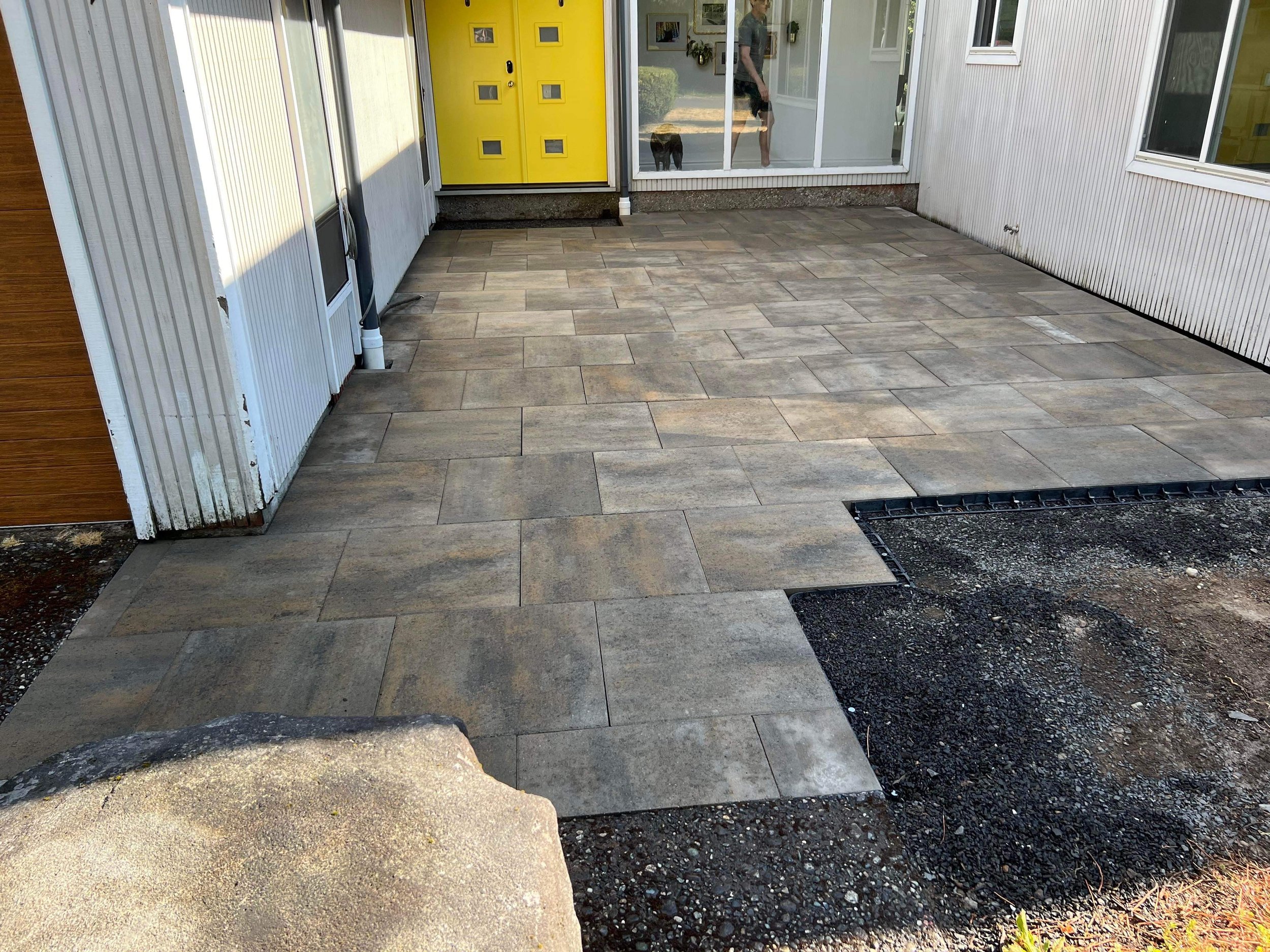 Installing a large paver patio.