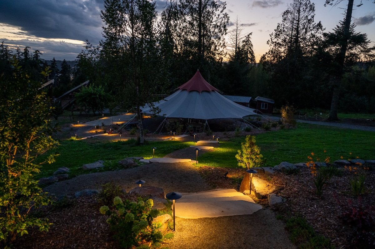 LED light guiding the way to a wedding tent.