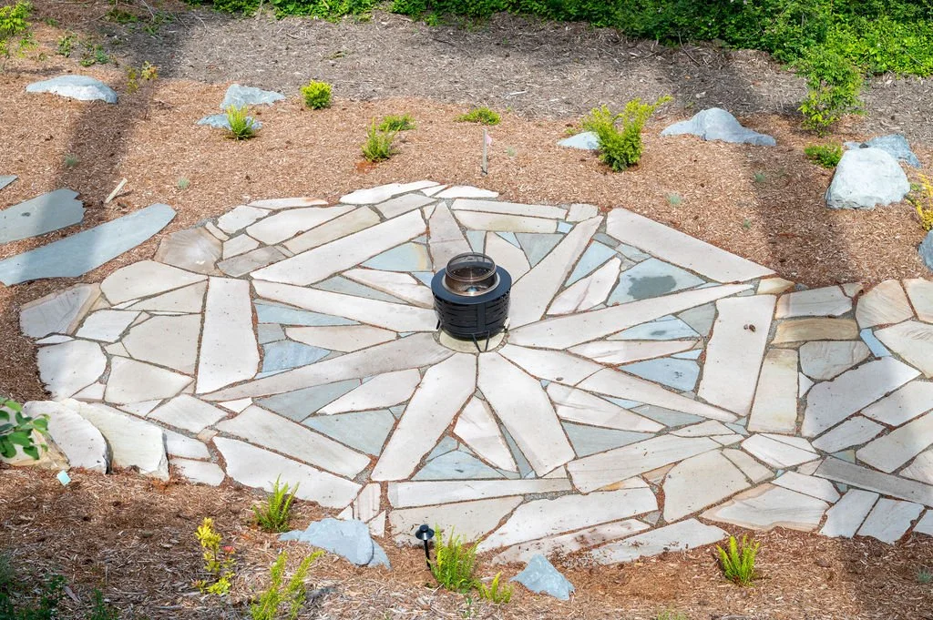 Mosaic centered slate patio.