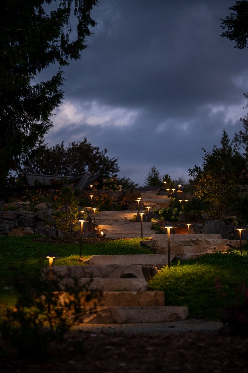 Stone staircase lit with LED lights.