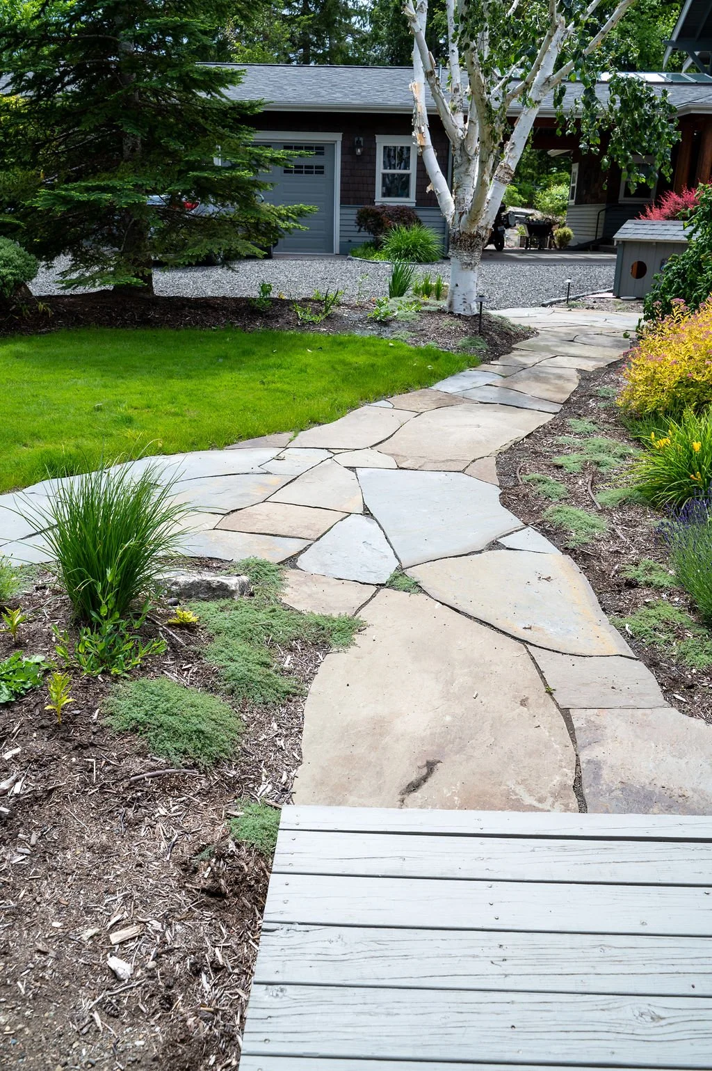 Slate walk way that splits into two directions.