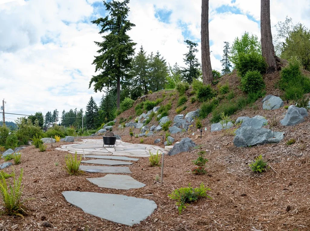 Slate path leading to large patio.