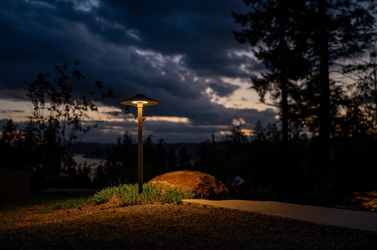 Sunset LED light along a gardens edge.
