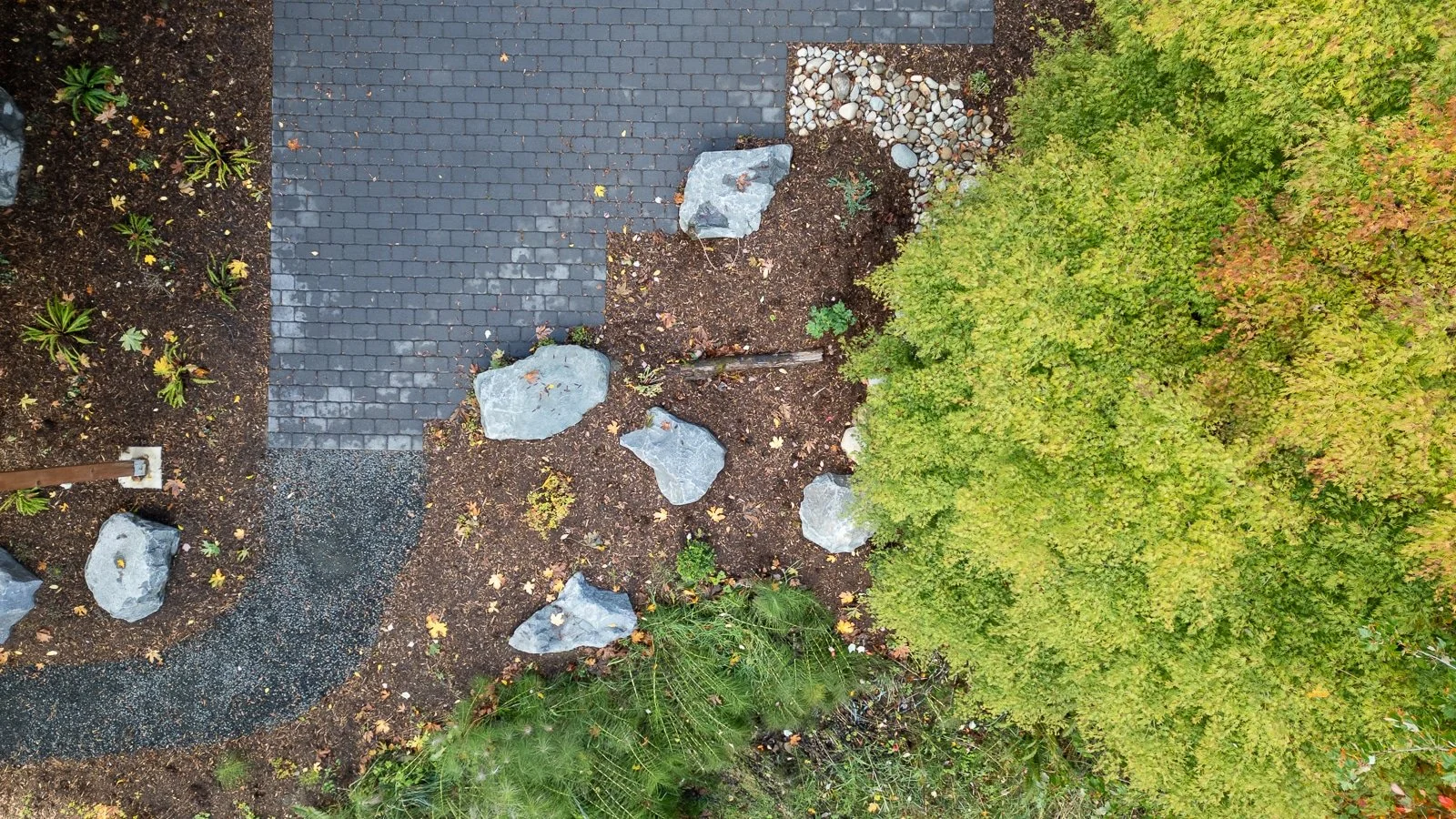 Aerial view of concrete paver patio and PNW garden scape 1.jpg