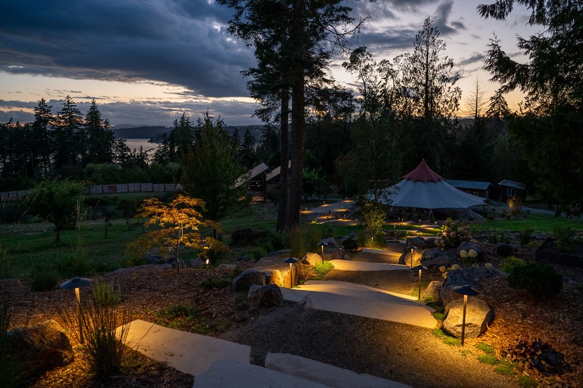 Spaced slate stones leading to a wedding tent.