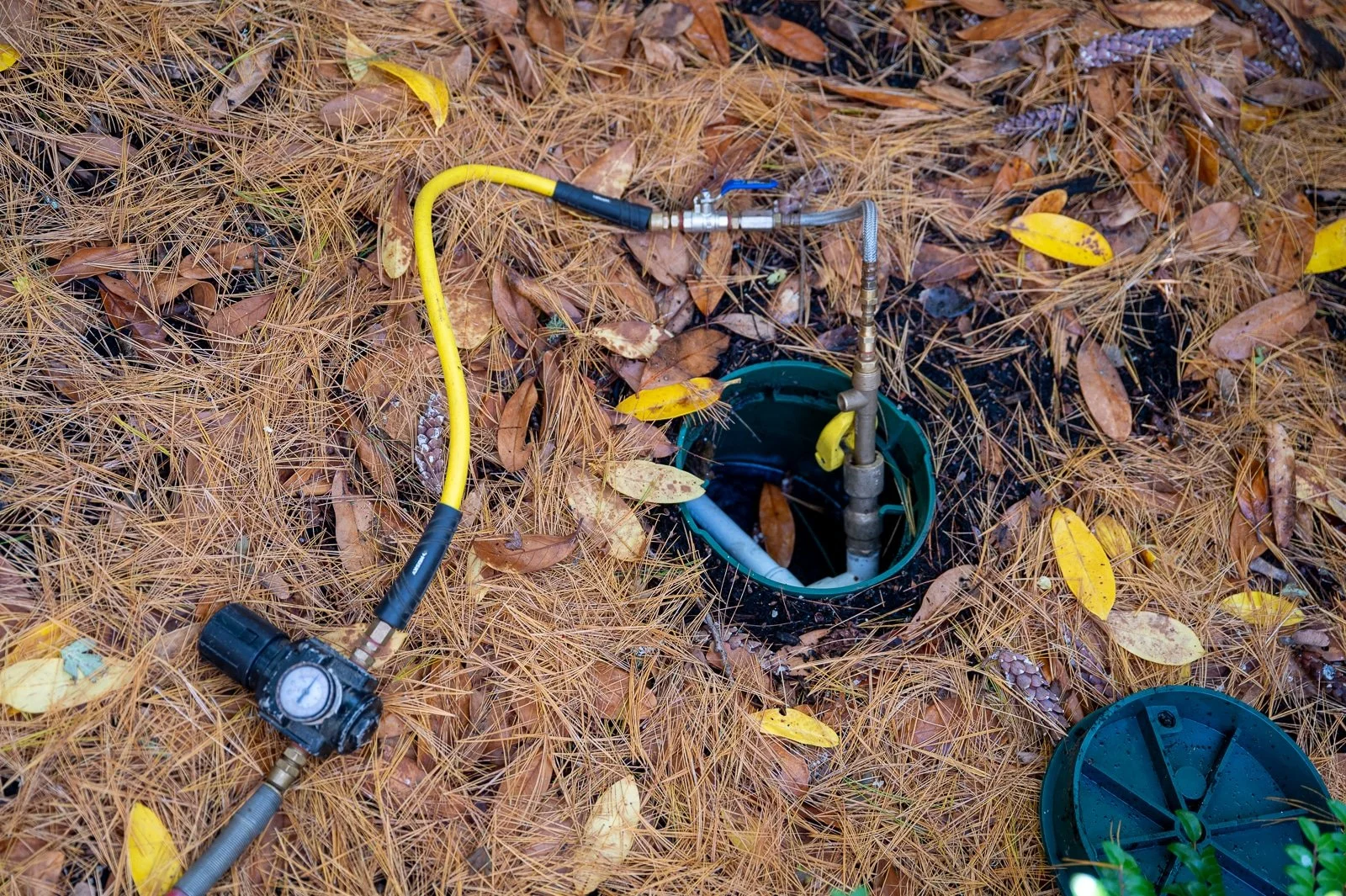PNW landscaper working on an irrigation system 1.jpg