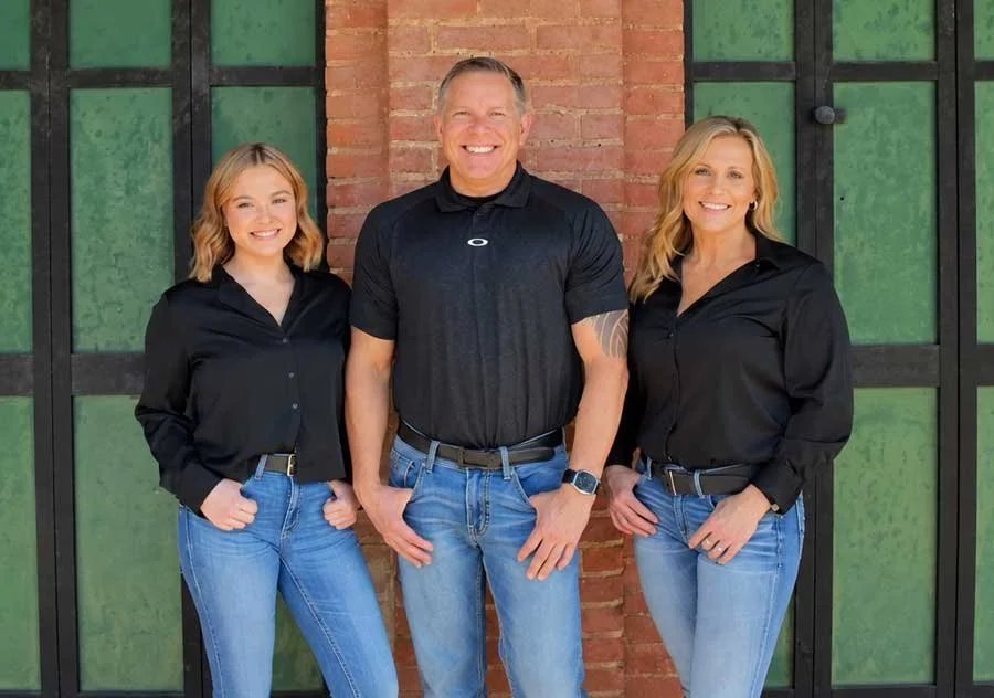 Three smiling people, Caliber Office Furniture Redding, CA office furniture team