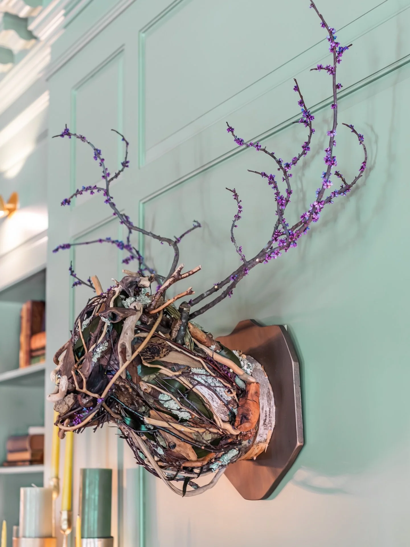 One of the most talked-about pieces in our room at @foundrymanor is designer Diana Vicenti&rsquo;s one-of-a-kind deer bust, handcrafted entirely from natural materials gathered right on the property. Branches, bark, moss, and lichen come together in 