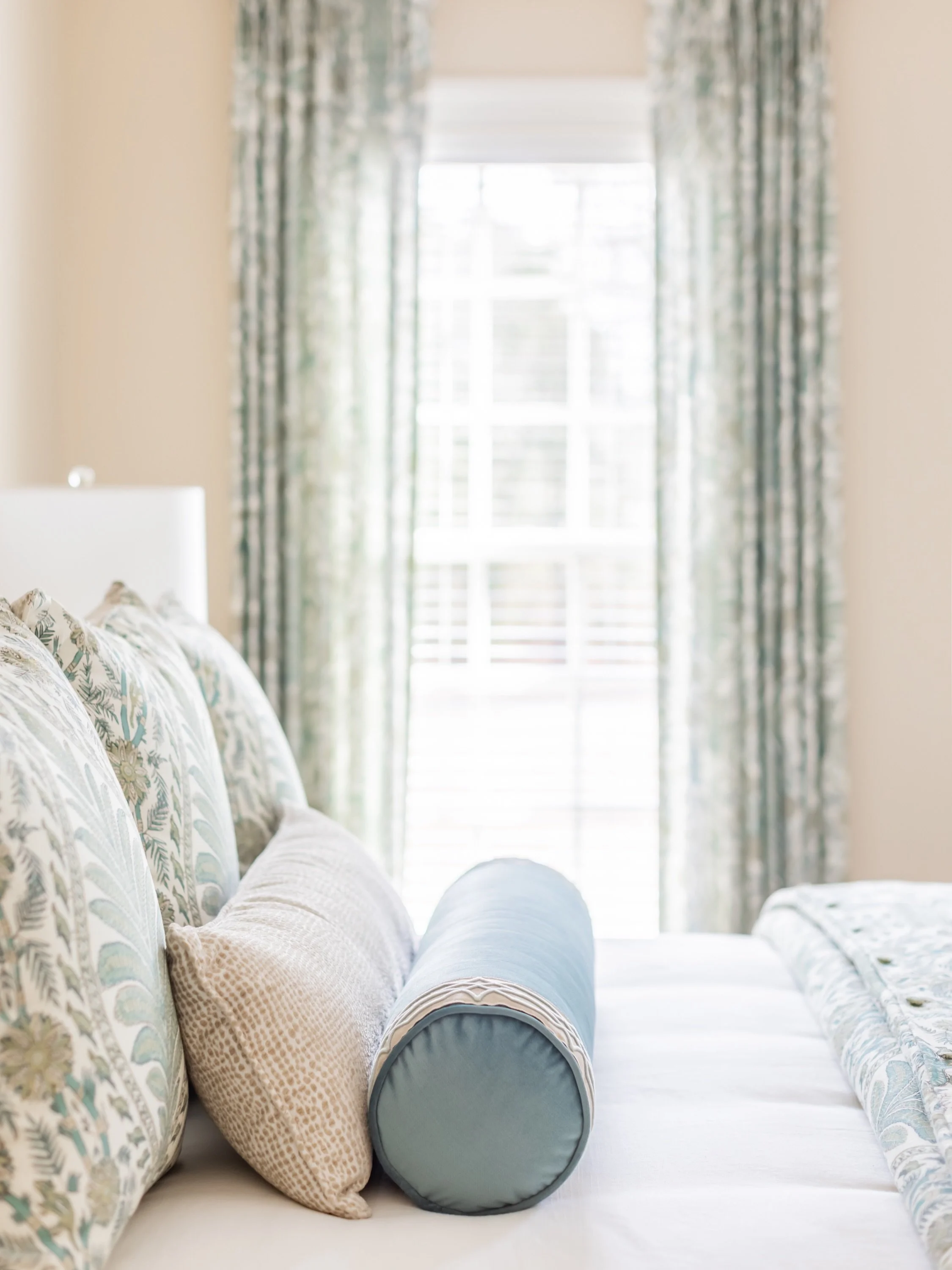 Every detail in this primary suite was chosen with intention,  from the custom bedding and window treatments to the upholstered pieces that tie the spaces together. 

In-Home Design Consultant and Designer @amyspearinginteriors carried the look throu