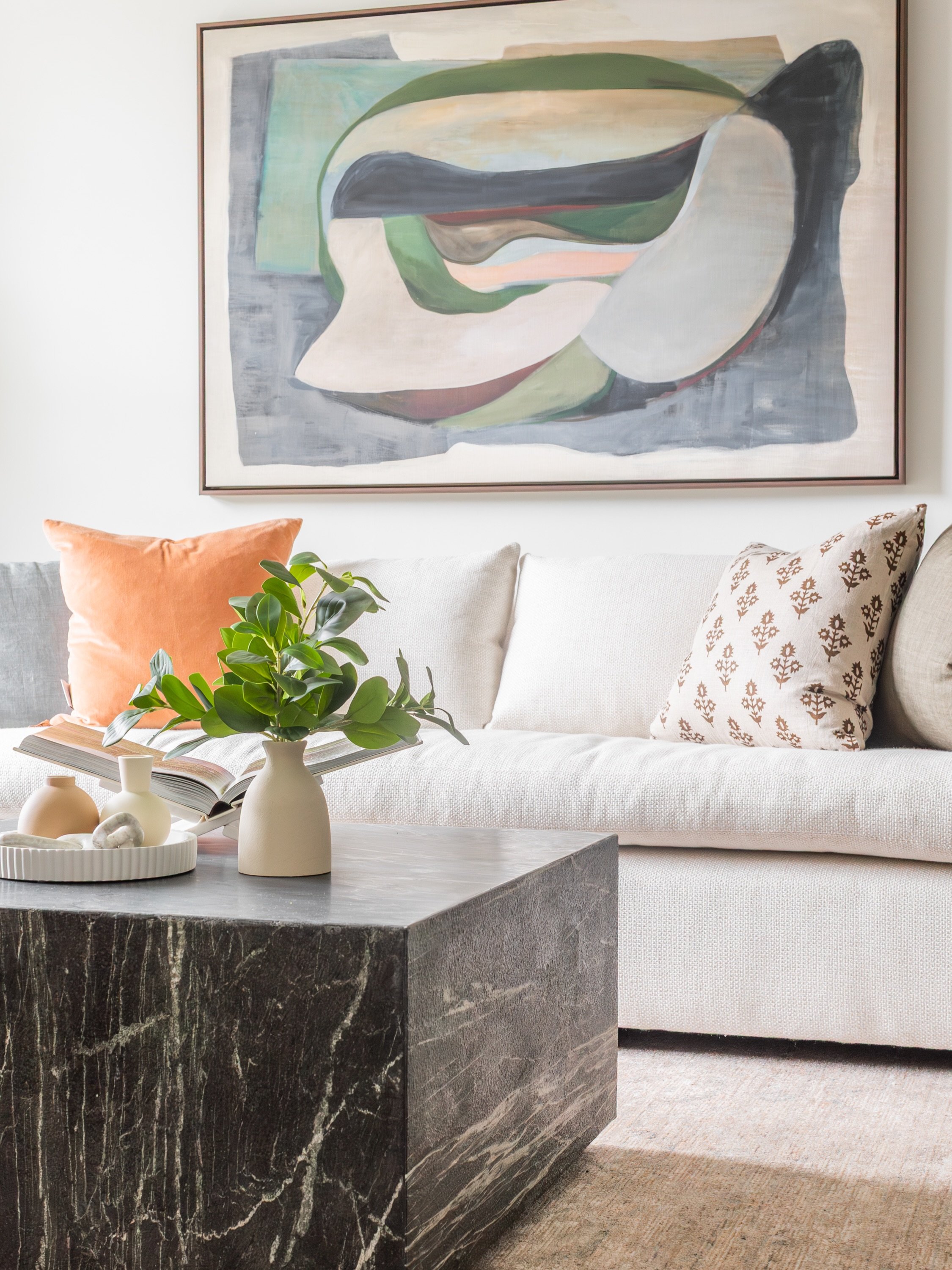 This space, designed by @designweinstein, brings together a @leeindustries sofa, custom drapery, a @loloirugs rug, artwork, and accessories for a look that feels comfortable, inviting, and livable. 

The coffee table, ottomans, accent tables, and pil
