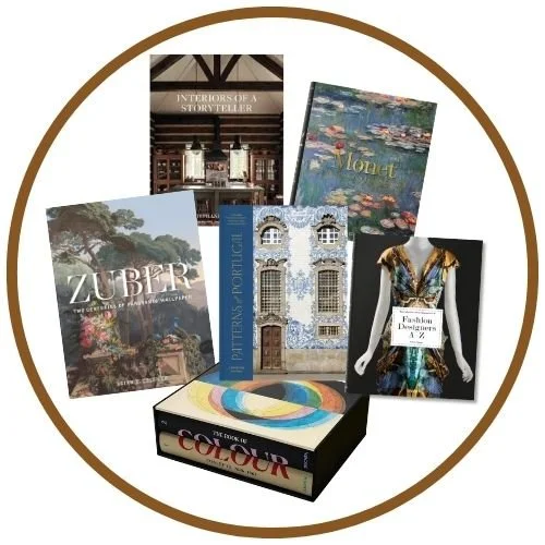 A curated selection of coffee table books, which can be styled on a living room table as a decorative and functional accent.