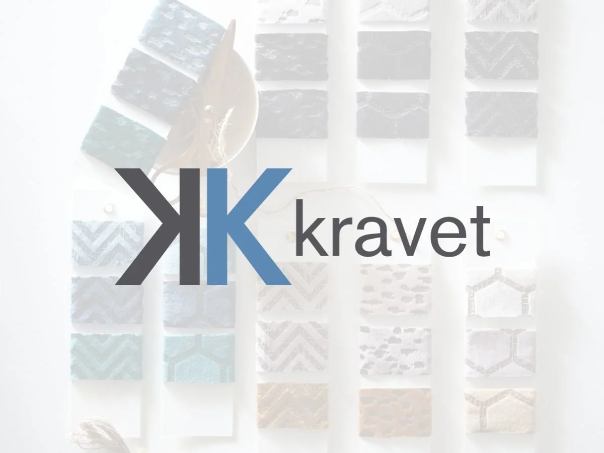 Kravet logo featured on a captivating photo of the brand's fabric and trim, offering a wide range of high-quality and stylish options for upholstery and home decor projects, available at u-fab.