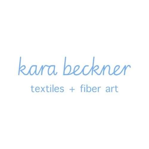 Logo with the text "kara beckner textiles + fiber art" in blue on a white background.