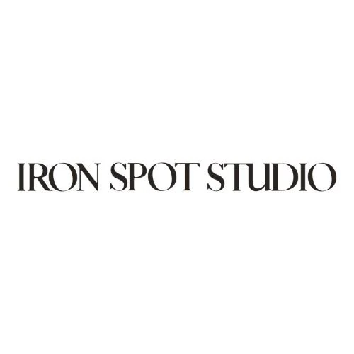 Logo for Iron Spot Studio with black text on a white background.