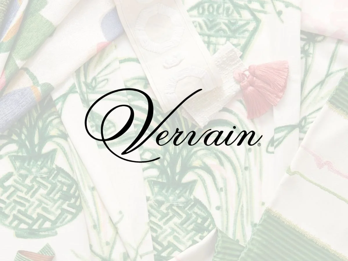 Vervain logo highlighted on an engaging photo of a meticulously arranged fabric and trim flatlay, showcasing a wide range of stylish options for your creative home decor projects, available at u-fab.