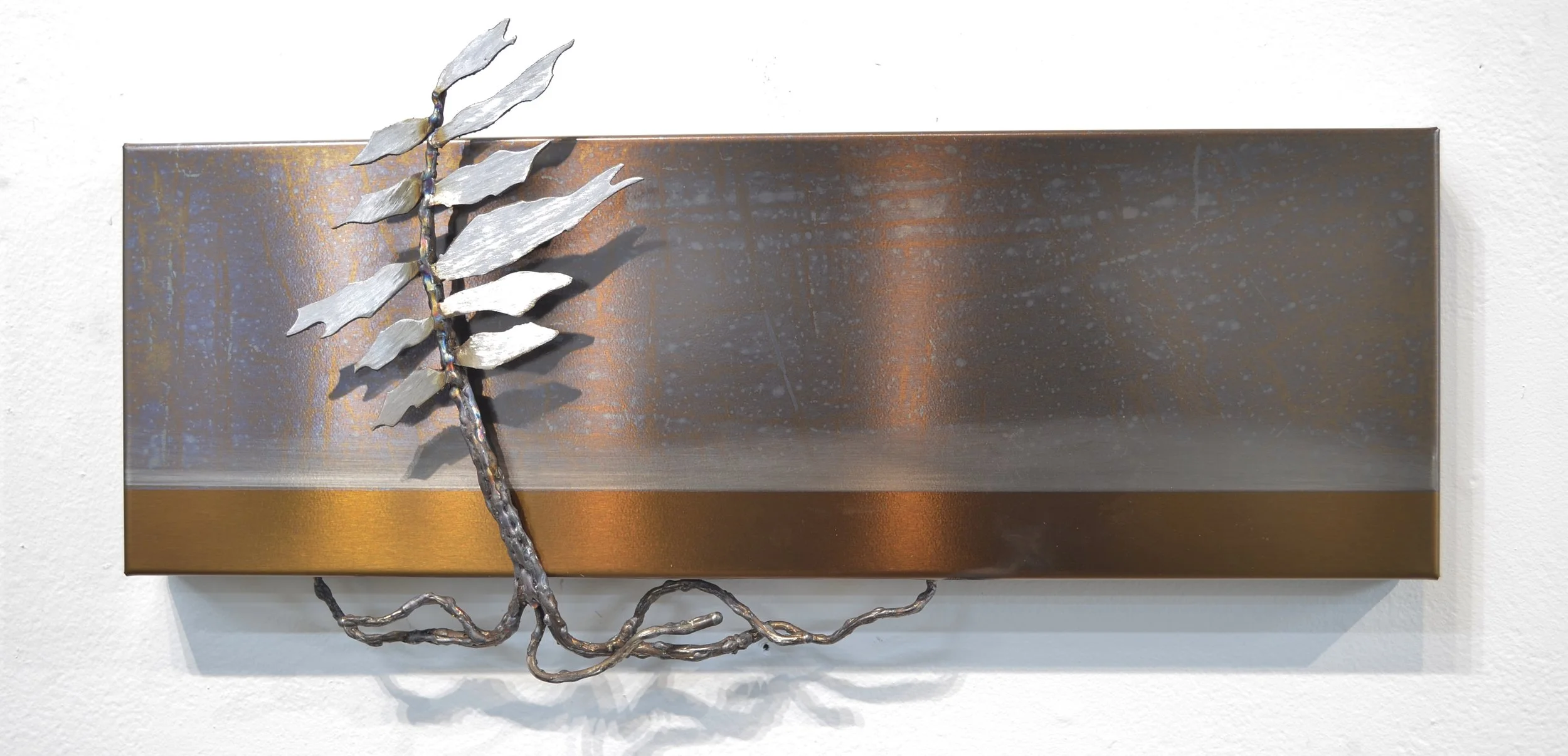 Deep Calm #25-291   
6"x18"x3"          
coated steel and stainless steel 
$ 550    