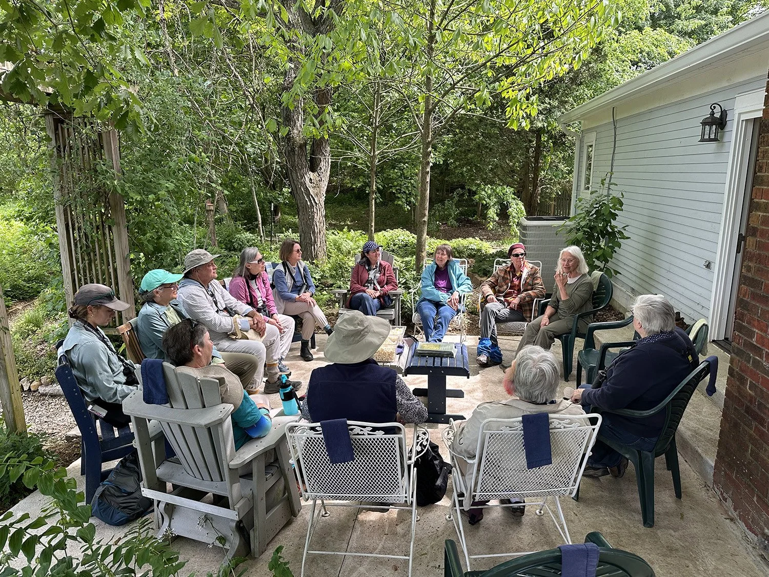 Birds by Song Participants listing to Arc Director, Nancy Stranahan before a walk at Ridgeview Farm. 