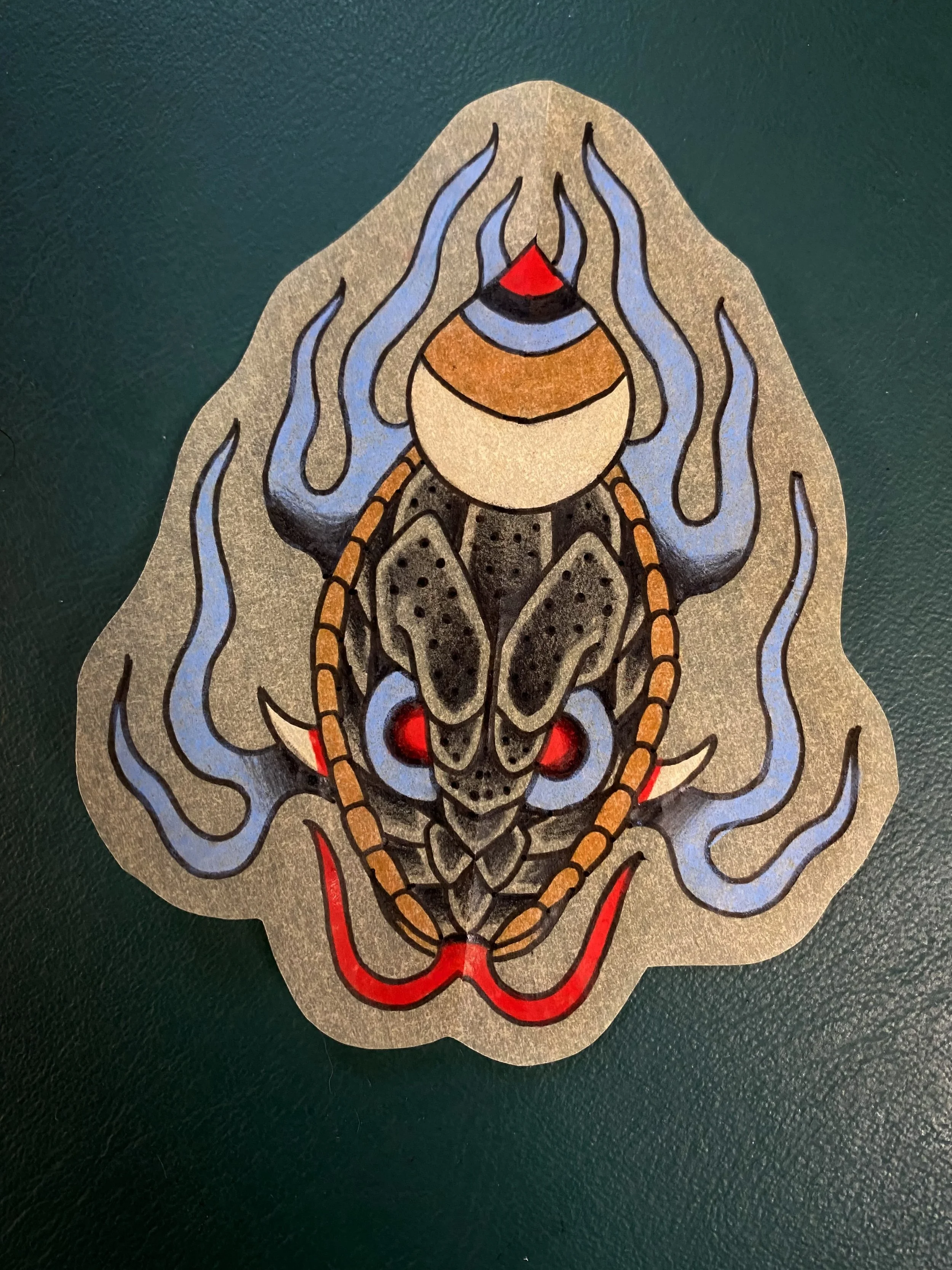 About 4/5 inches tall. Excellent for the arm above or below the inner crease, back of neck, or other placements.