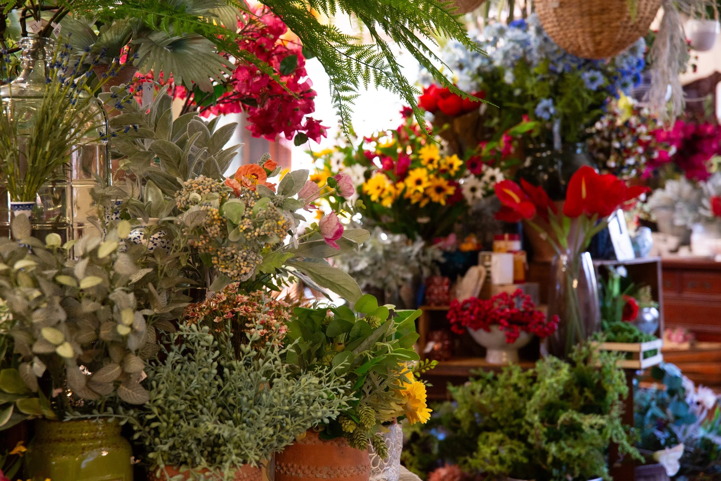 Colorful floral and home decor display inside a Skippack, Pennsylvania retail shop.