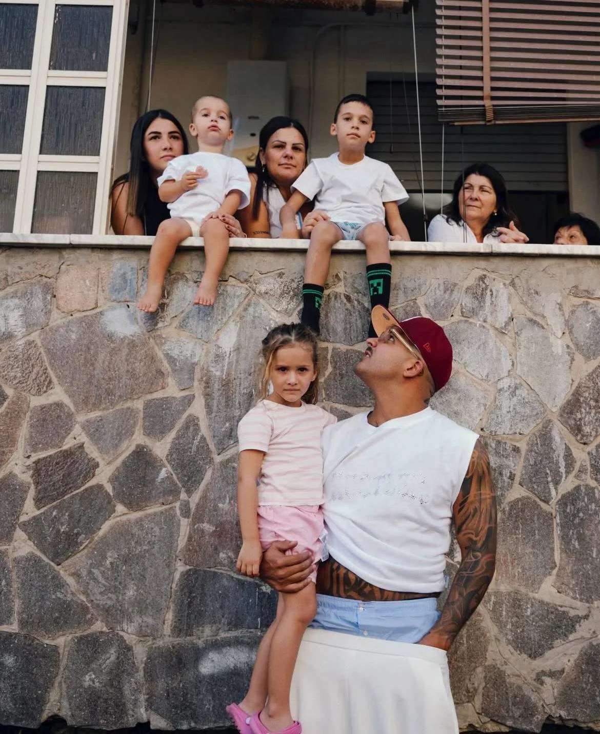 Geolier wearing In Einem Atem custom made Hustler Tank Top and Pants