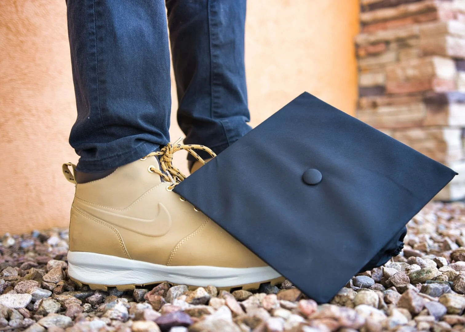 High school graduation session with cap and nike shoes
