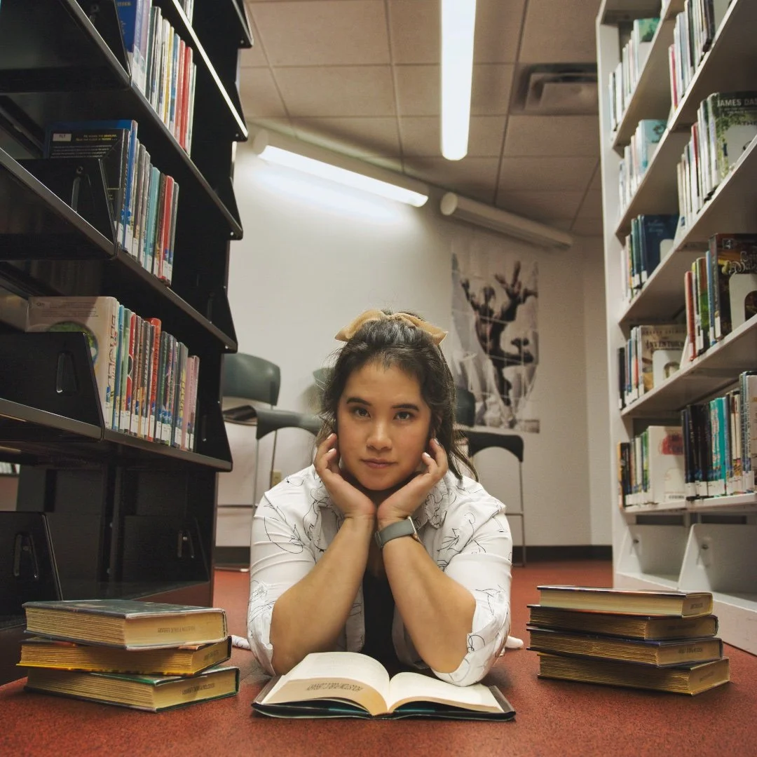 Portrait Photography in Houston at the Houston Library for a spontaneous graduation photography session