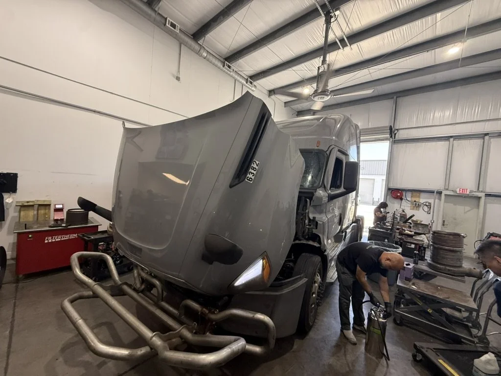 Precision DPF tech performing A/C repair