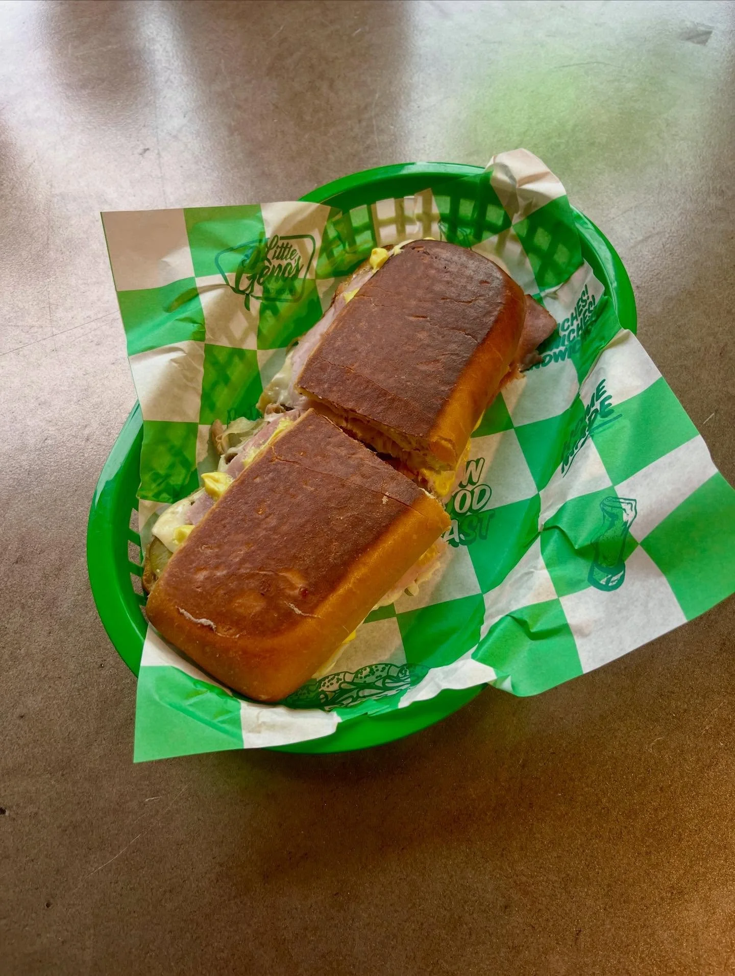 CUBANO

Grilled Cuban Bread
Roast Mojo Pork Shoulder
Sliced Ham
Swiss Cheese
Pickles
Mustard Aioli