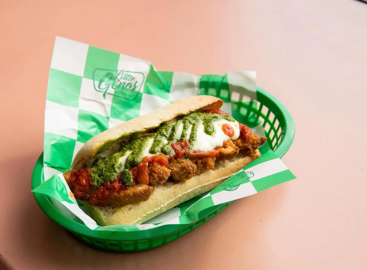 CHICKEN PARM 
Crusty Ciabatta 
Parmesan Garlic Butter
Crispy Breaded Chicken
Vodka Marina Sauce
Buffalo Mozzarella 
Basil Pesto