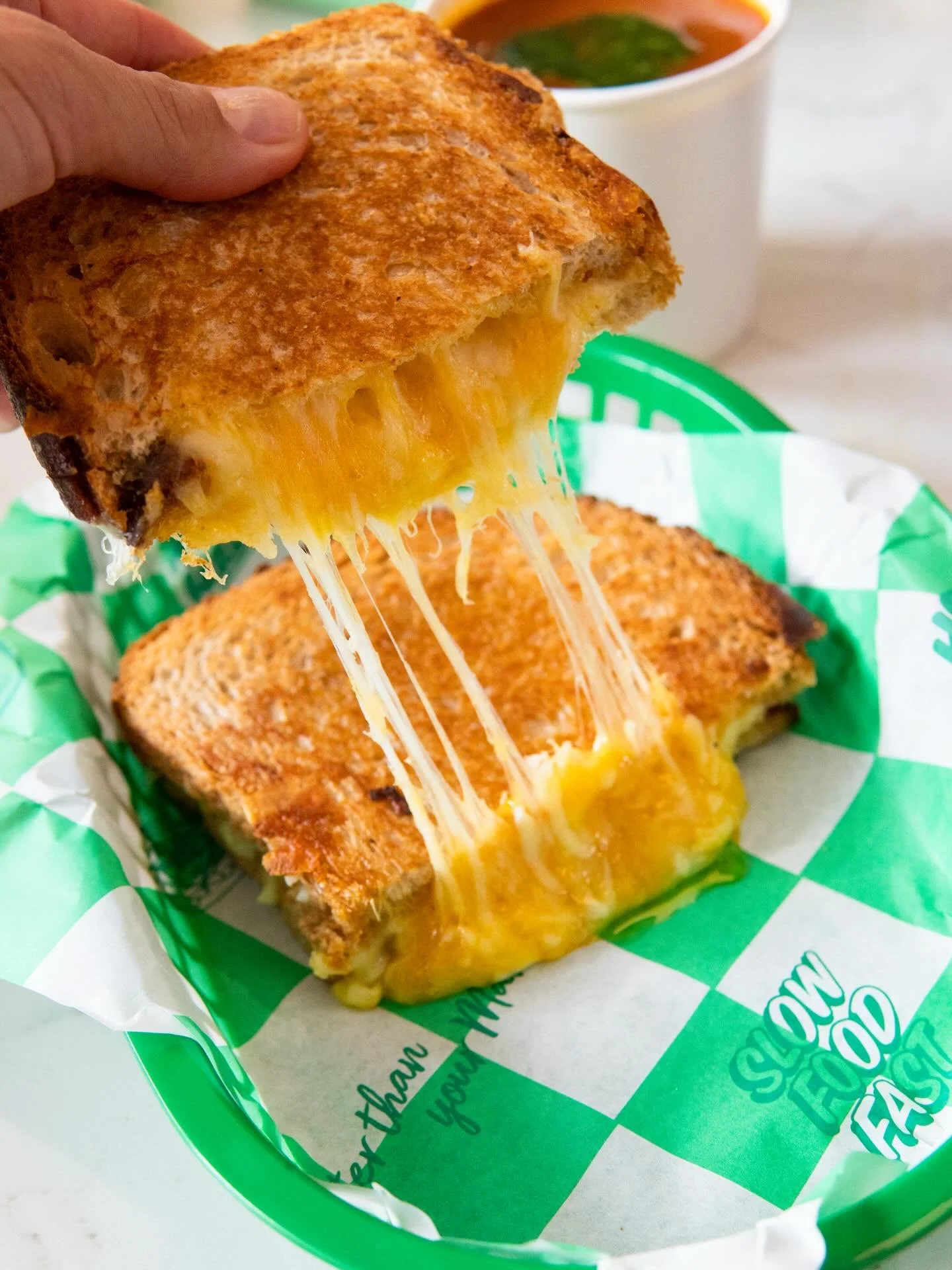 Grilled Triple Cheese with Chilli Butter
Roasted Tomato, Pepper + Butternut Squash Soup with Basil Pesto