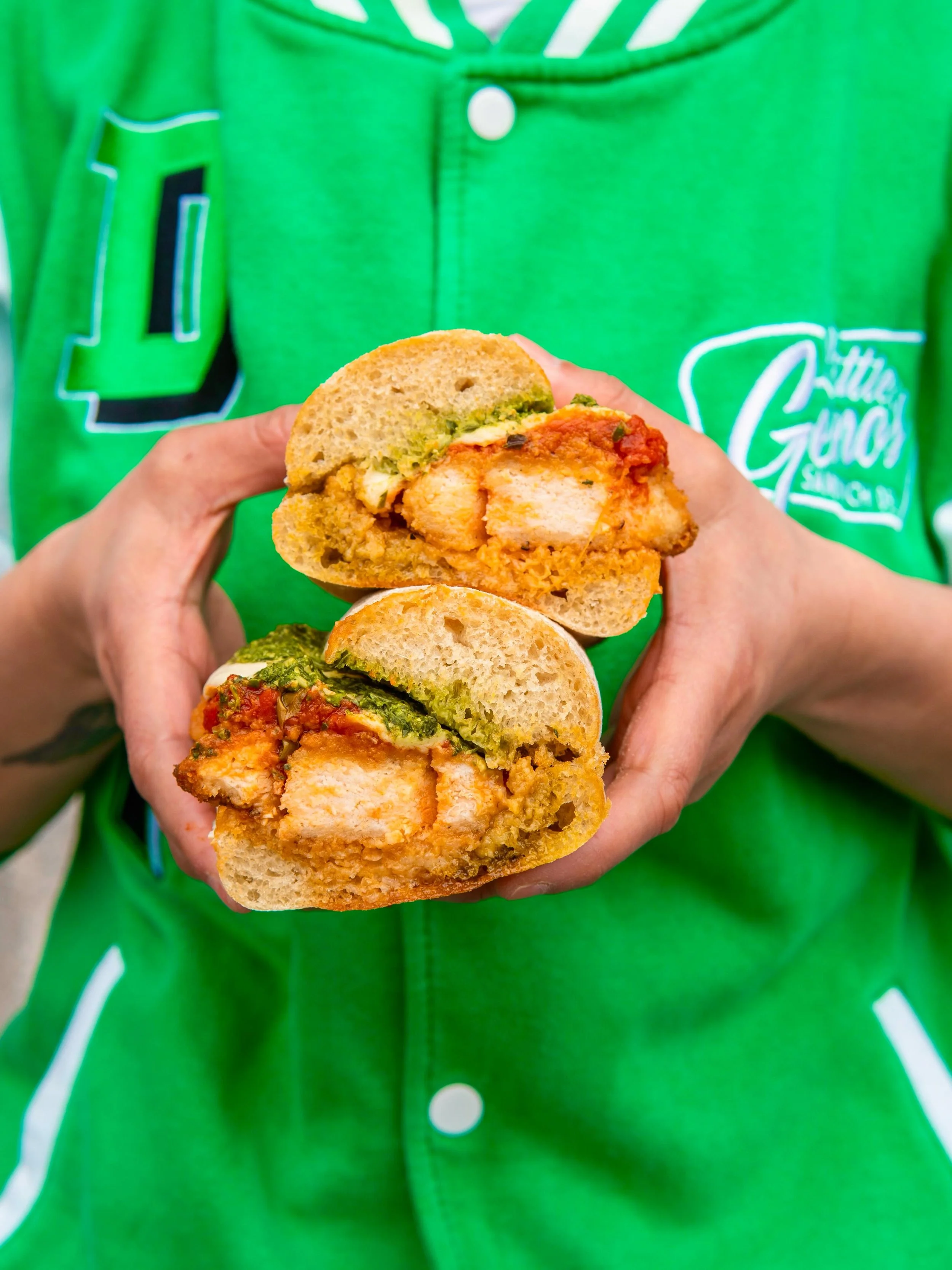 CHICKEN PARM 
Crusty Ciabatta 
Parmesan Garlic Butter
Crispy Breaded Chicken
Vodka Marinara Sauce
Buffalo Mozzarella 
Basil Pesto