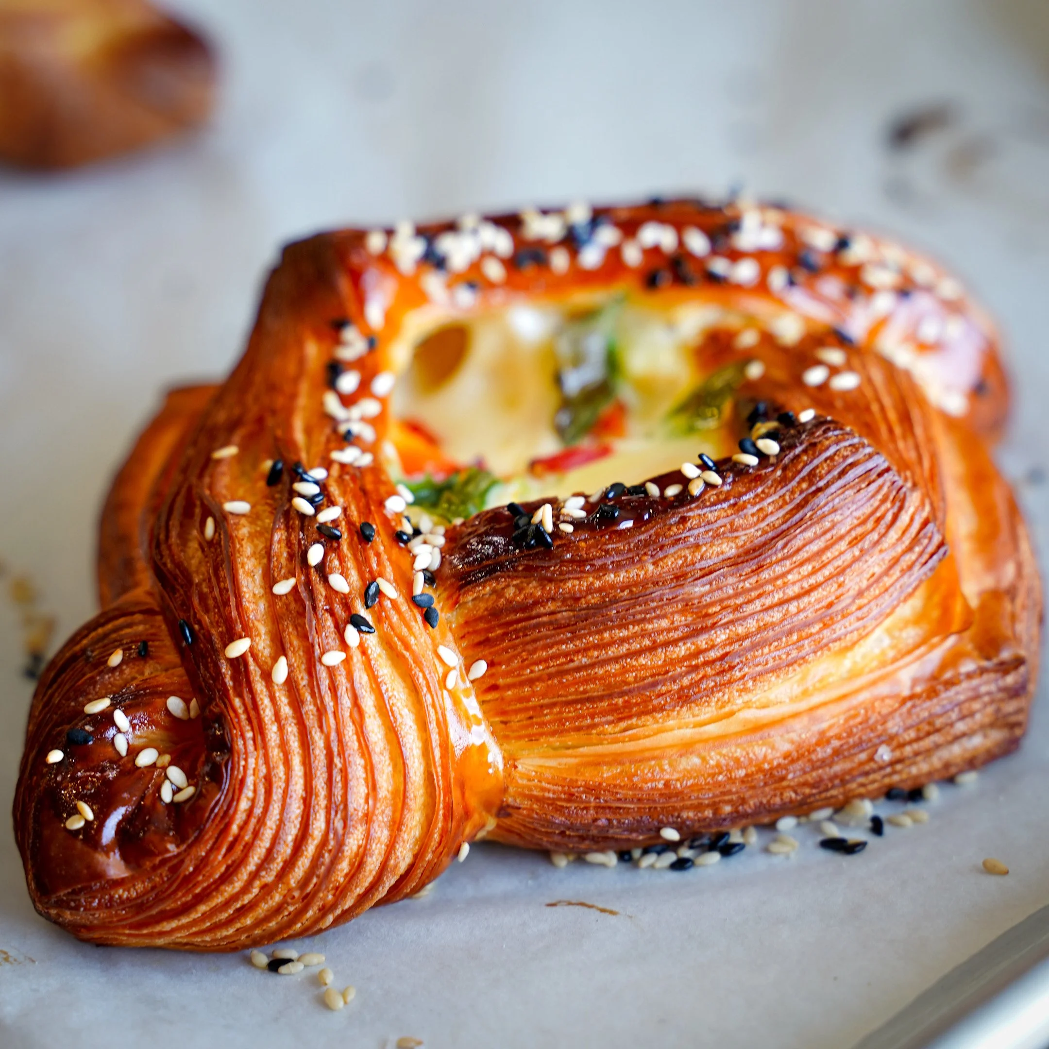 a savoury danish on a white table