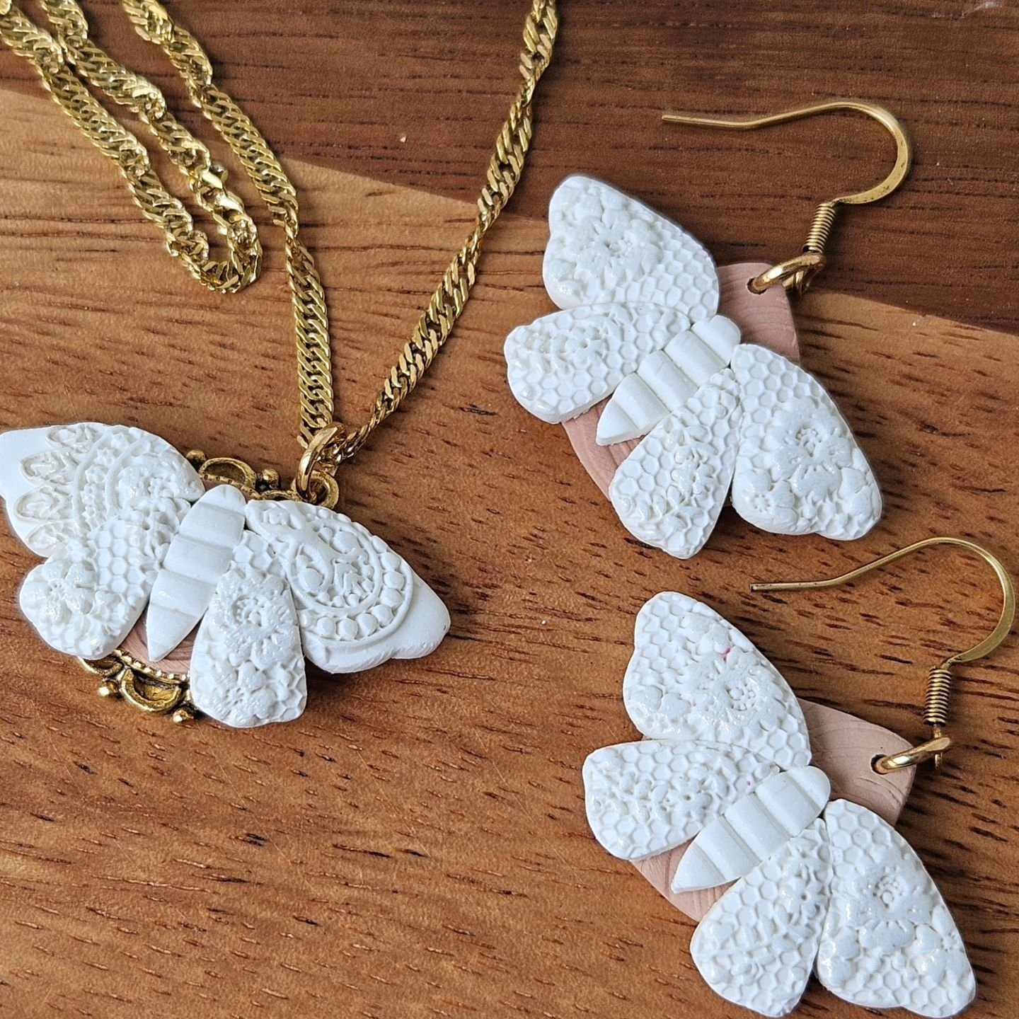 I have had moths on my &quot;to make&quot; list for a while now. Honestly, so many of the items from the latest Etsy update were ideas I have had for a year now. It feels good to finally get them made!

I love this moth set! Ivory with a lace texture